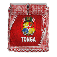 Red duvet cover with Tonga crest and 'TONGA' across center; white geometric edges