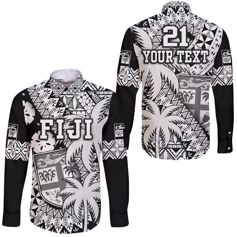 Black long sleeve button-up shirt with white tribal tropical print and chest graphic panel