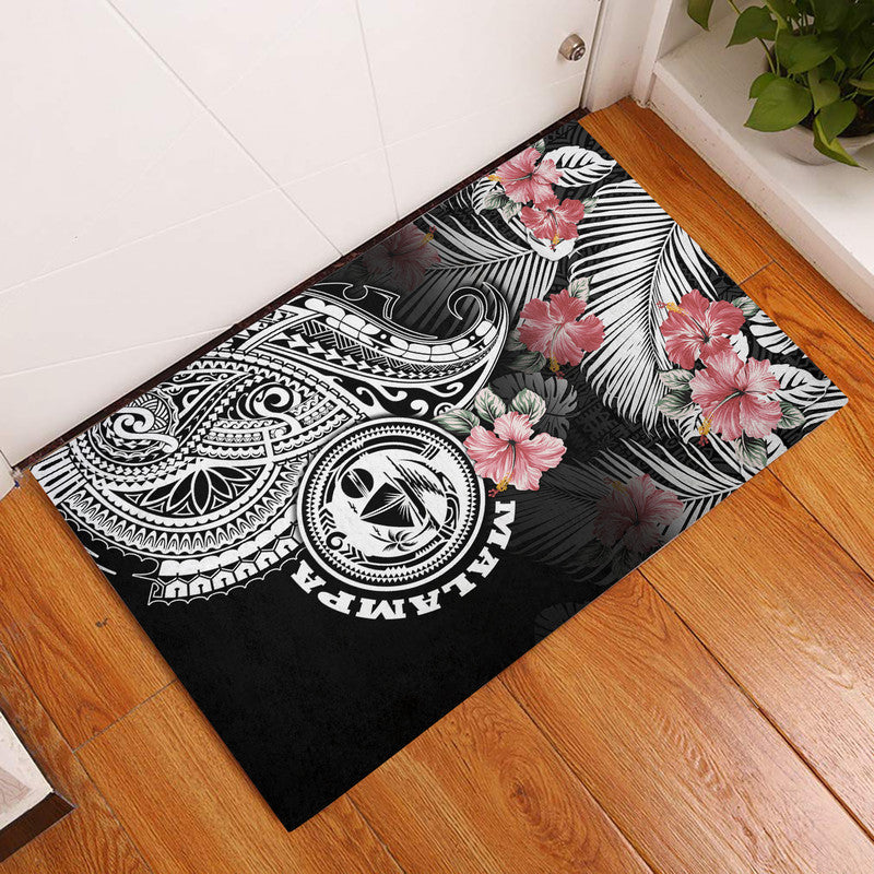 Black door mat with hibiscus flowers and tribal Polynesian tattoo pattern