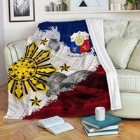 Philippines eagle tribal blanket on sofa with blue top stripe, red bottom bands, white field