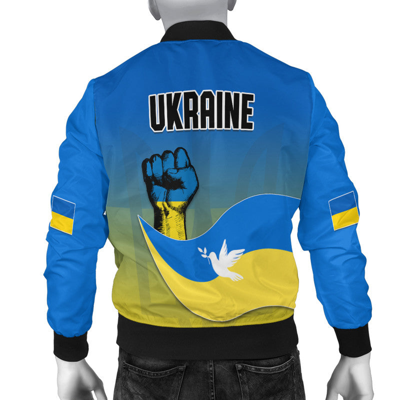 Back of blue bomber jacket with 'UKRAINE' text, fist emblem, and yellow wave graphic