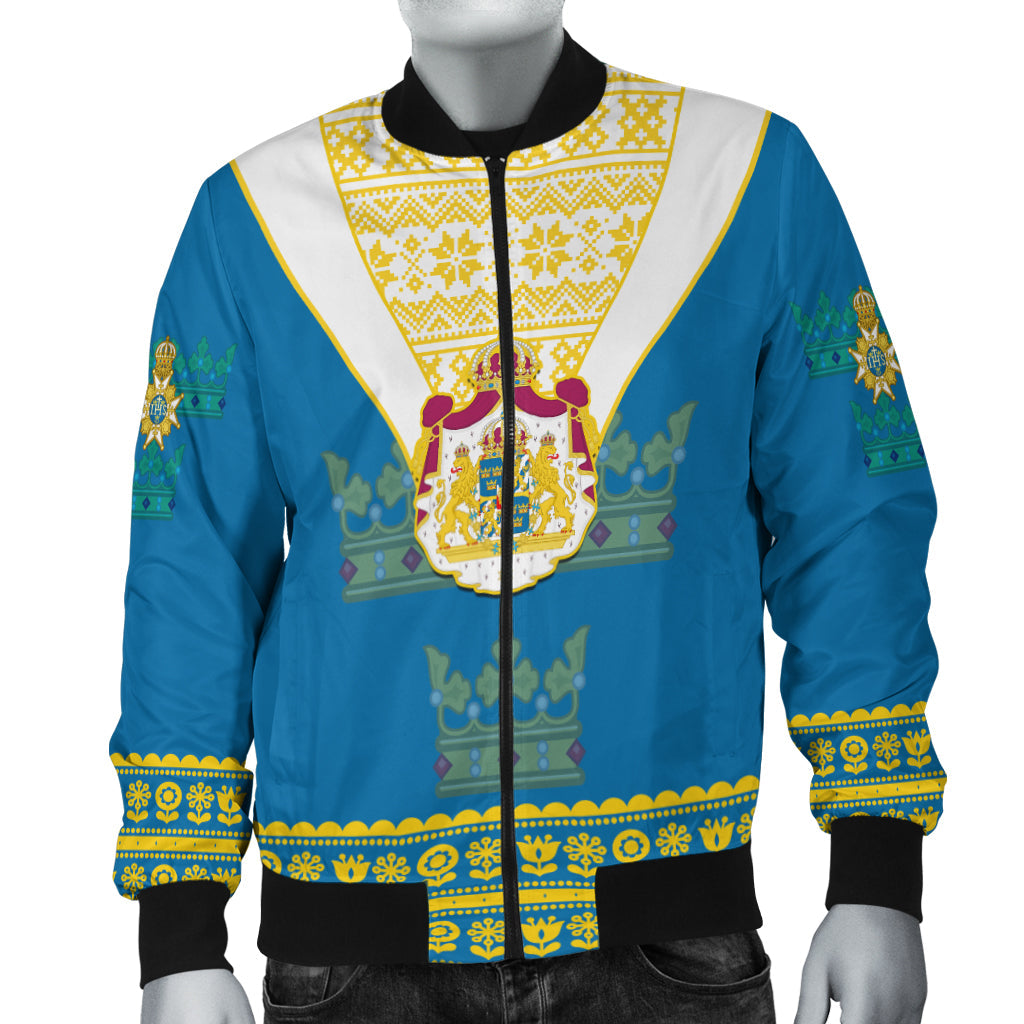 Blue bomber jacket with zip front, yellow Nordic panel and crest graphic, ribbed hem