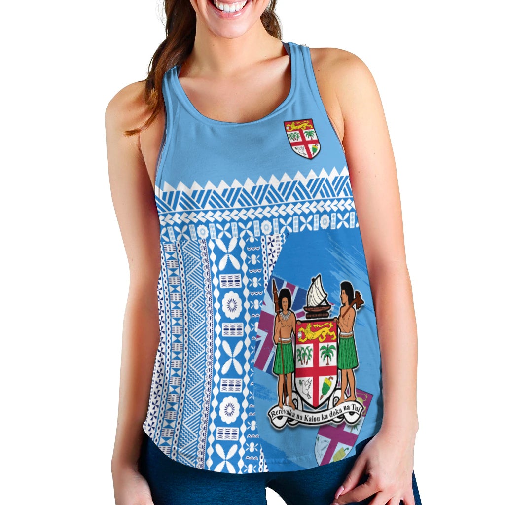 Blue women’s racerback tank with Fiji-inspired tapa pattern and crest graphic on chest