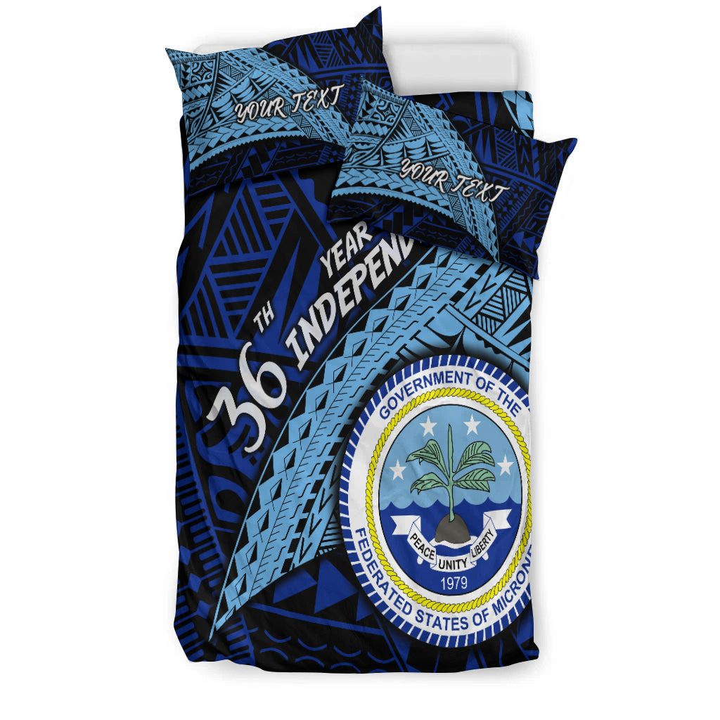 Blue bedding set with crest logo and geometric Year of Independence design on duvet