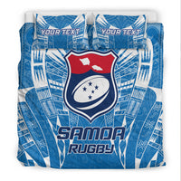 Blue Samoa rugby bedding set with crest shield center; two pillows show 'YOUR TEXT'