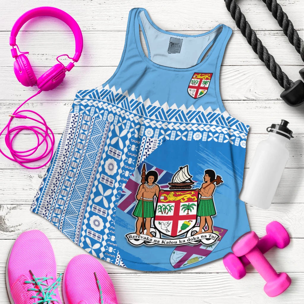 Blue racerback tank top with tapa pattern front and crest graphic, scoop neckline