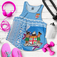 Blue racerback tank top with tapa pattern front and crest graphic, scoop neckline