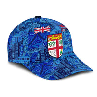 Blue classic cap angled view, tropical tribal print with shield and crest