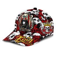 Skull and crown graphic baseball cap in red, black, and white, curved brim