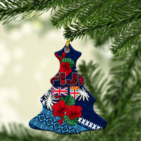 Blue star-shaped ceramic ornament with Fiji lettering, flags, hibiscus flowers and palm print.