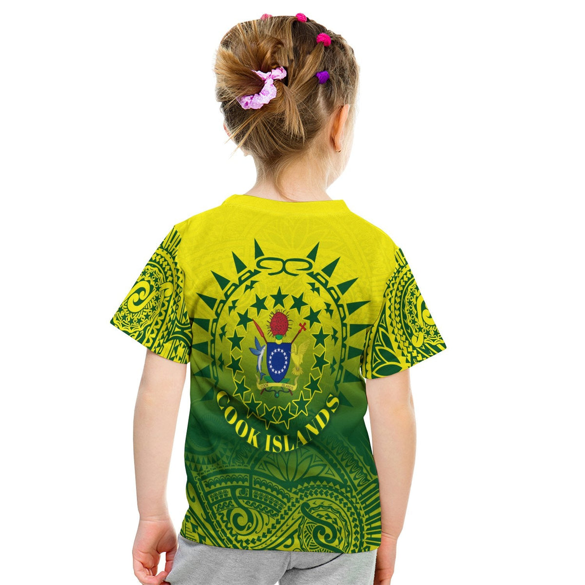 Back of kid T-shirt: green polynesian tattoo sun with 'COOK ISLANDS' text