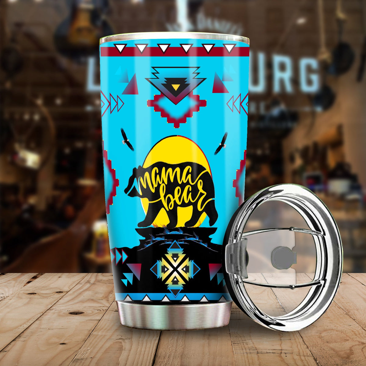 20oz tumbler with Native American bear and “mama bear” tribal pattern, lid open