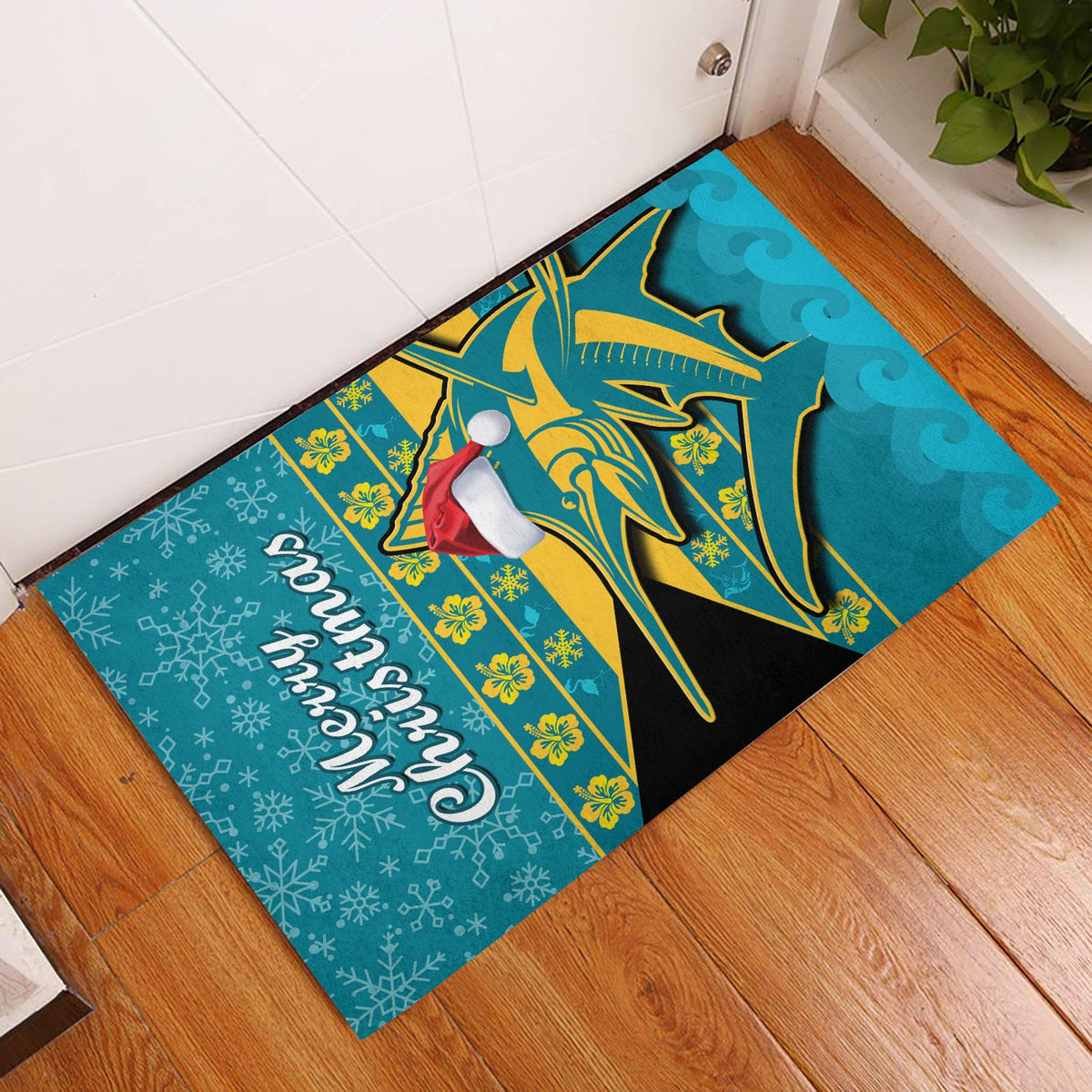 Blue door mat with teal marlin and “Merry Christmas” text, black border