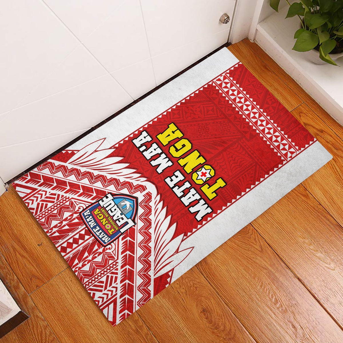 Tonga rugby door mat with red tribal pattern, white border and large Tonga lettering