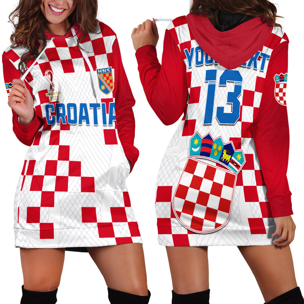 Red and white checked hoodie dress with hood, long sleeves, and front kangaroo pocket
