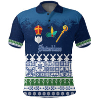Blue polo shirt with Sinterklaas graphic, festive patterns and striped trim