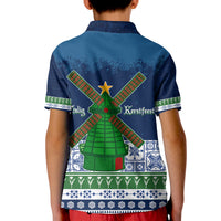 Kids blue polo back: large green Christmas tree and Delft pattern bands