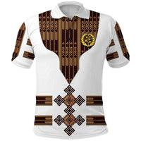 White polo shirt with brown geometric stripe panel, gold crest, and diamond center print