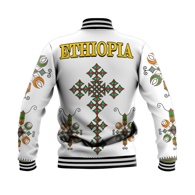 White baseball jacket back with large ETHIOPIA text, diamond cross, striped cuffs