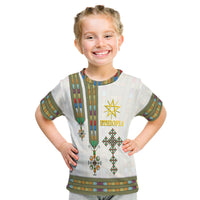Kids white Ethiopia T-shirt front with gold “ETHIOPIA” text and multicolor tribal design