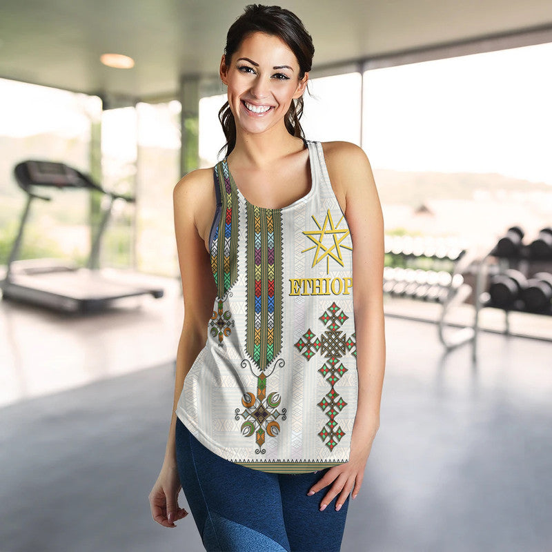 White racerback tank with Ethiopian stripe print, gold star and “Ethiopia” front view