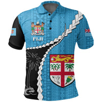 Fiji Masi rugby polo shirt, blue with black sleeves, crest and diagonal geometric stripe