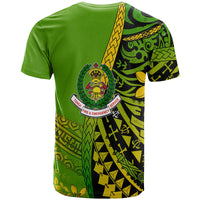 Green T-shirt back with Polynesian pattern stripe and central fire-emblem logo, short sleeves.