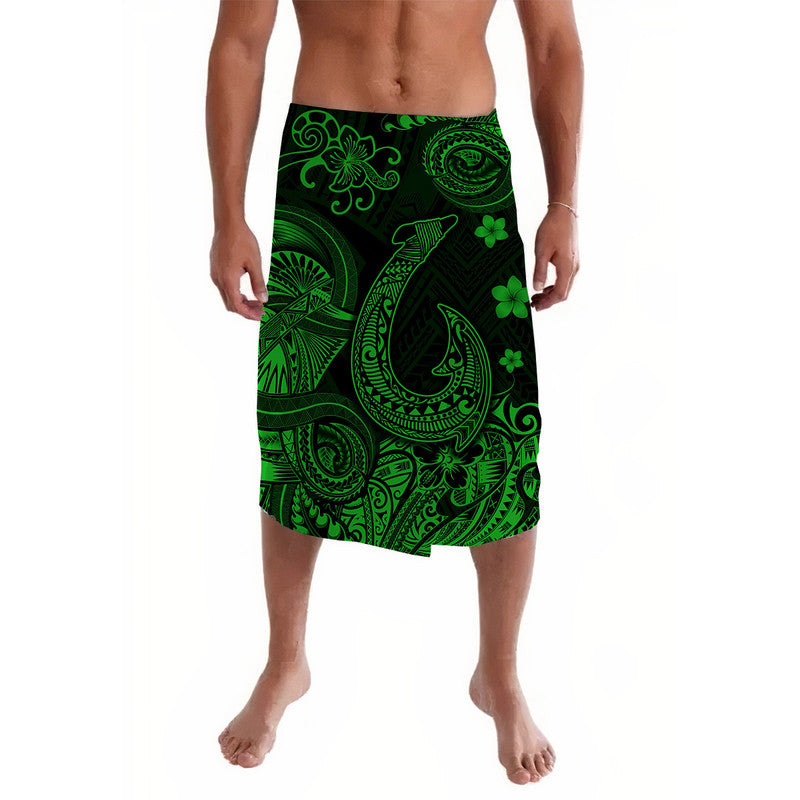 Green and black Polynesian-style lavalava skirt with fish hook tribal print