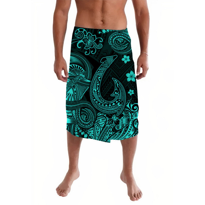 Black lavalava skirt with turquoise Polynesian fish and floral pattern, elastic waist