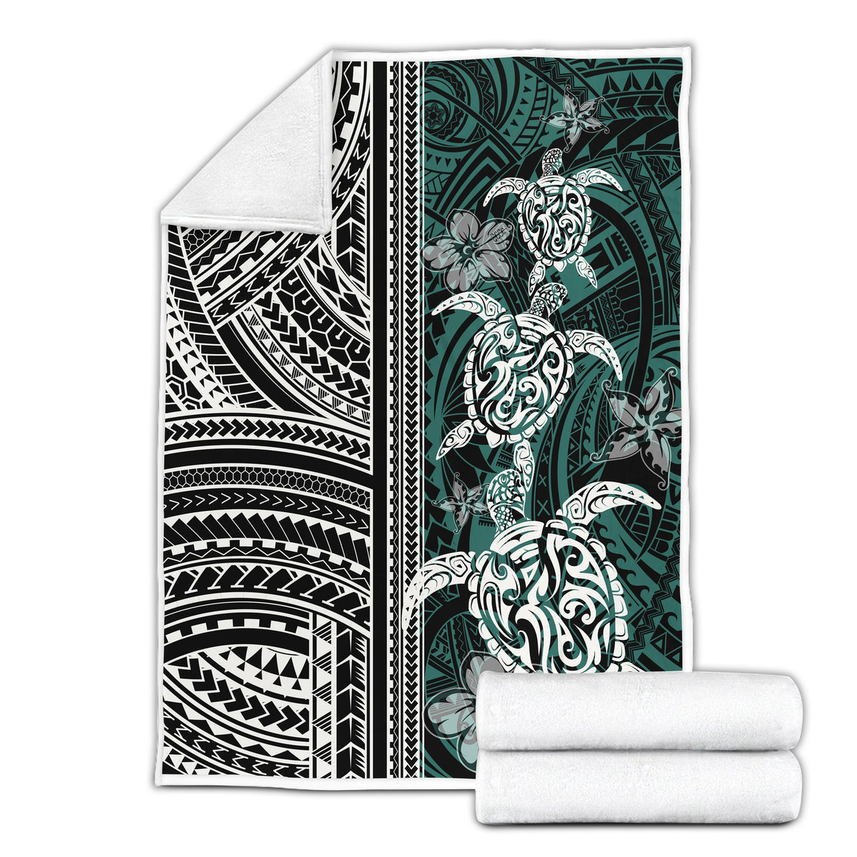 Folded Polynesian turtle blanket with floral motifs, black/white/green, with rolled matching blankets