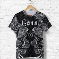 Black T-shirt with Gemini zodiac graphic, Polynesian-style faces in white and gray
