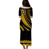 Long black-and-gold patterned dress with round back and short sleeves