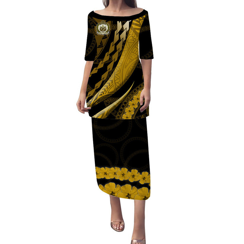 Long black-and-gold patterned dress with round neckline and short sleeves