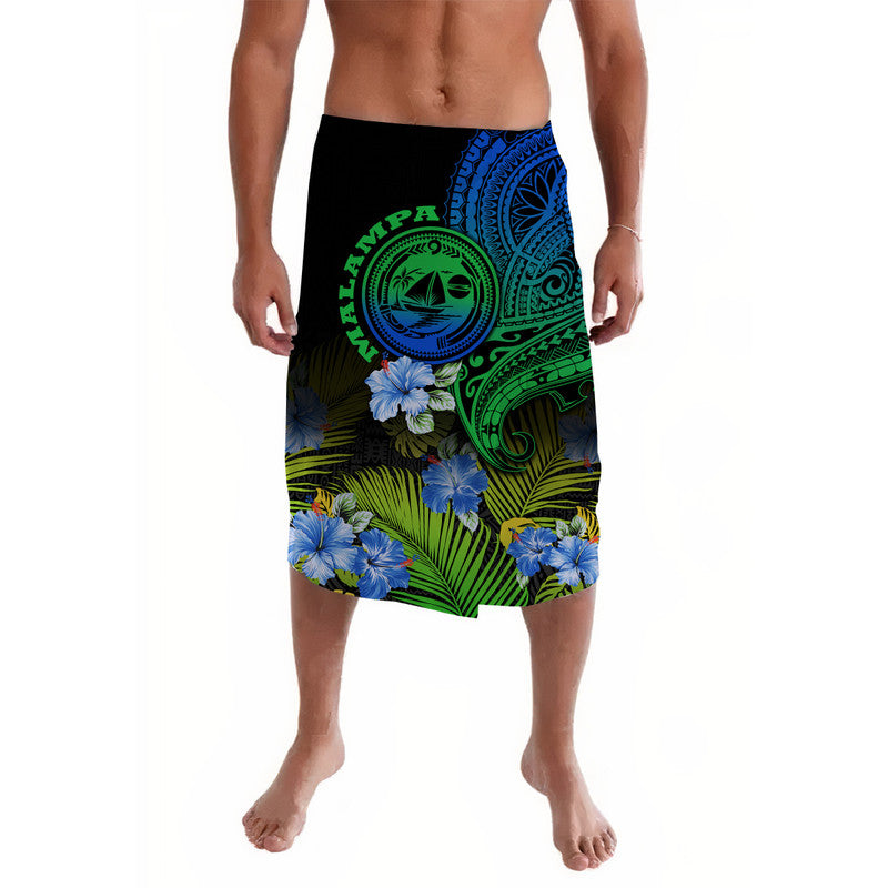 Men's tropical print shorts with tribal circle and blue hibiscus flowers, green-blue gradient