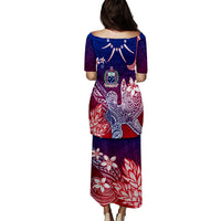 Long puletasi dress, back view, blue and red gradient with floral and shark motifs