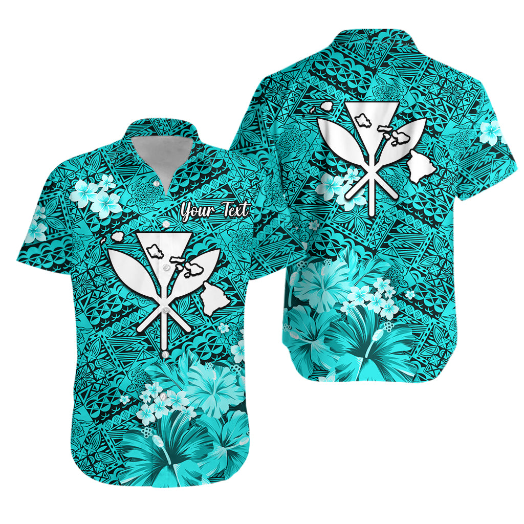 Turquoise Hawaiian shirt with white turtle map, tropical flowers and leaf pattern