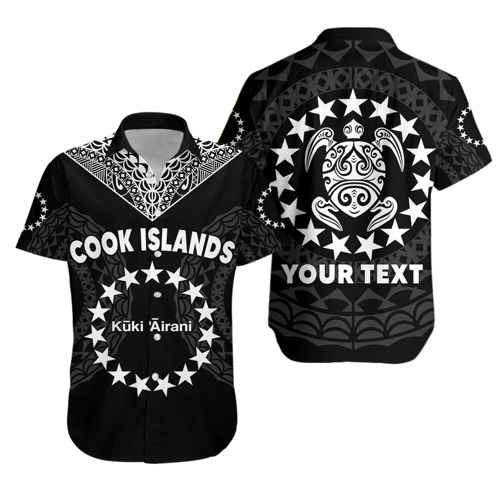 Black Hawaiian shirt, short-sleeve button front, white star and turtle prints