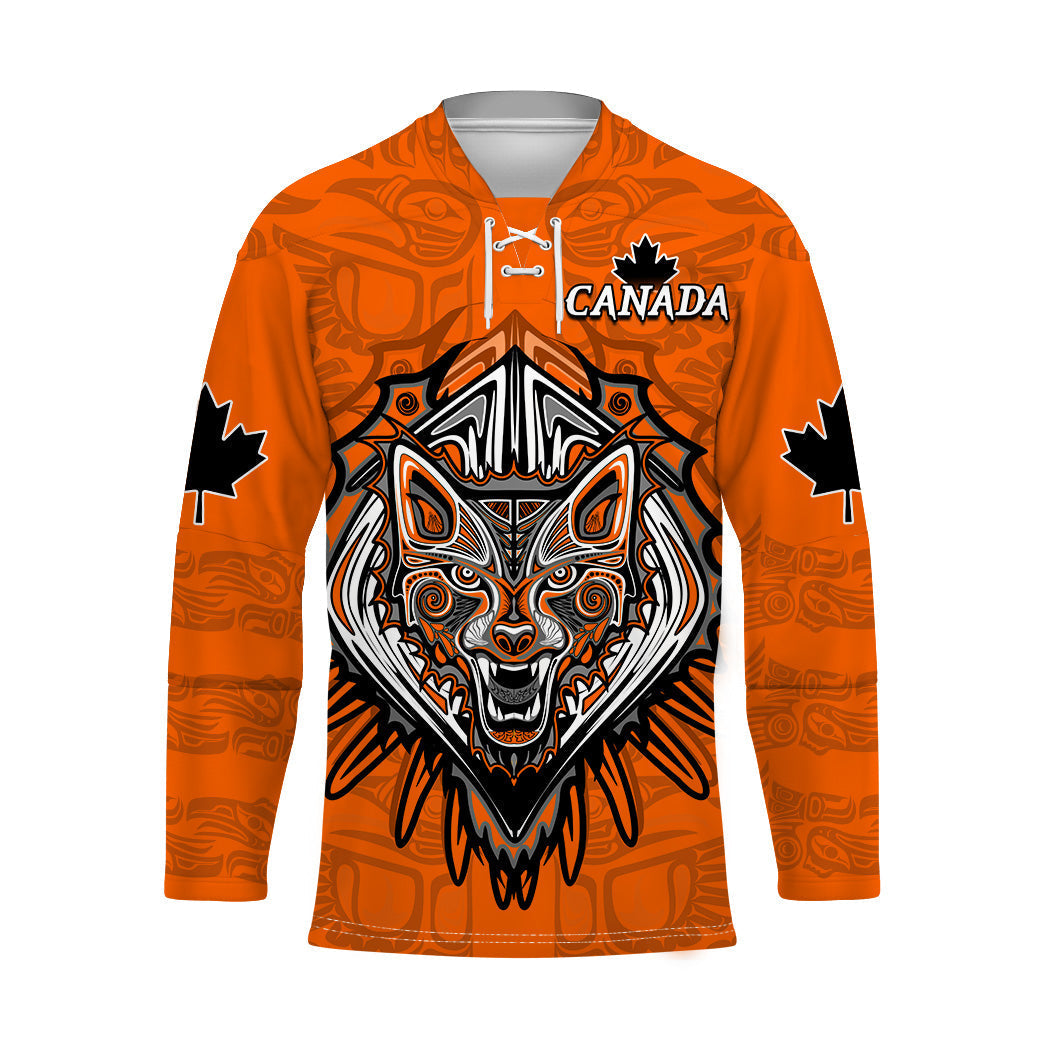 Orange unisex hockey jersey with Canada text, wolf face graphic and dark sleeve stars