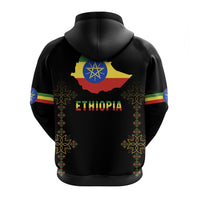 Black pullover hoodie back print: Ethiopia map emblem, flag stripes, and decorative border motifs