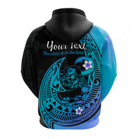 Back of turquoise gradient pullover hoodie with black panel and polynesian-style fishhook art