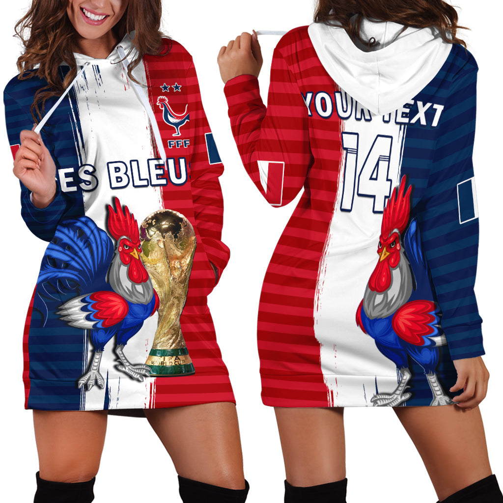 White hoodie dress with red and blue panels, long sleeves, front graphic, hood