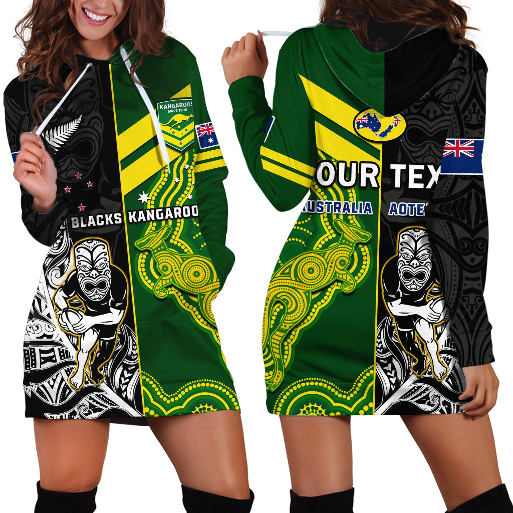 Black hoodie dress with green and yellow Aboriginal-inspired kangaroo graphics, front zip
