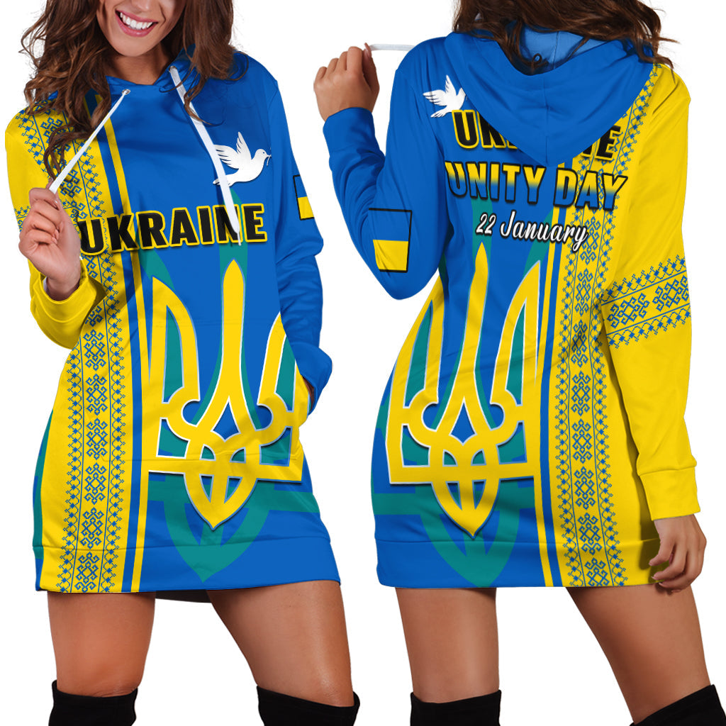 Blue hoodie dress with front zip, yellow patterned trim, large Unity Day graphic.