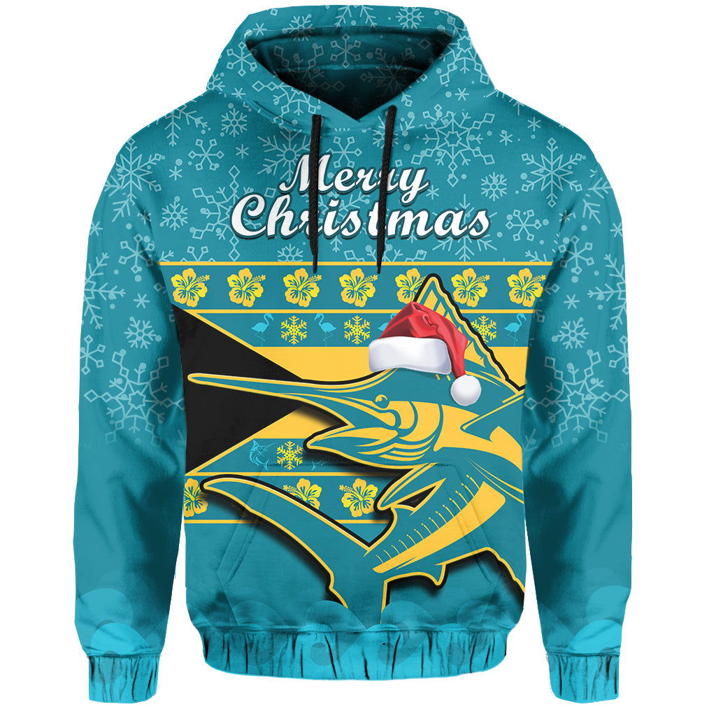 Teal pullover hoodie with front “Merry Christmas” graphic and Santa hat over marlin