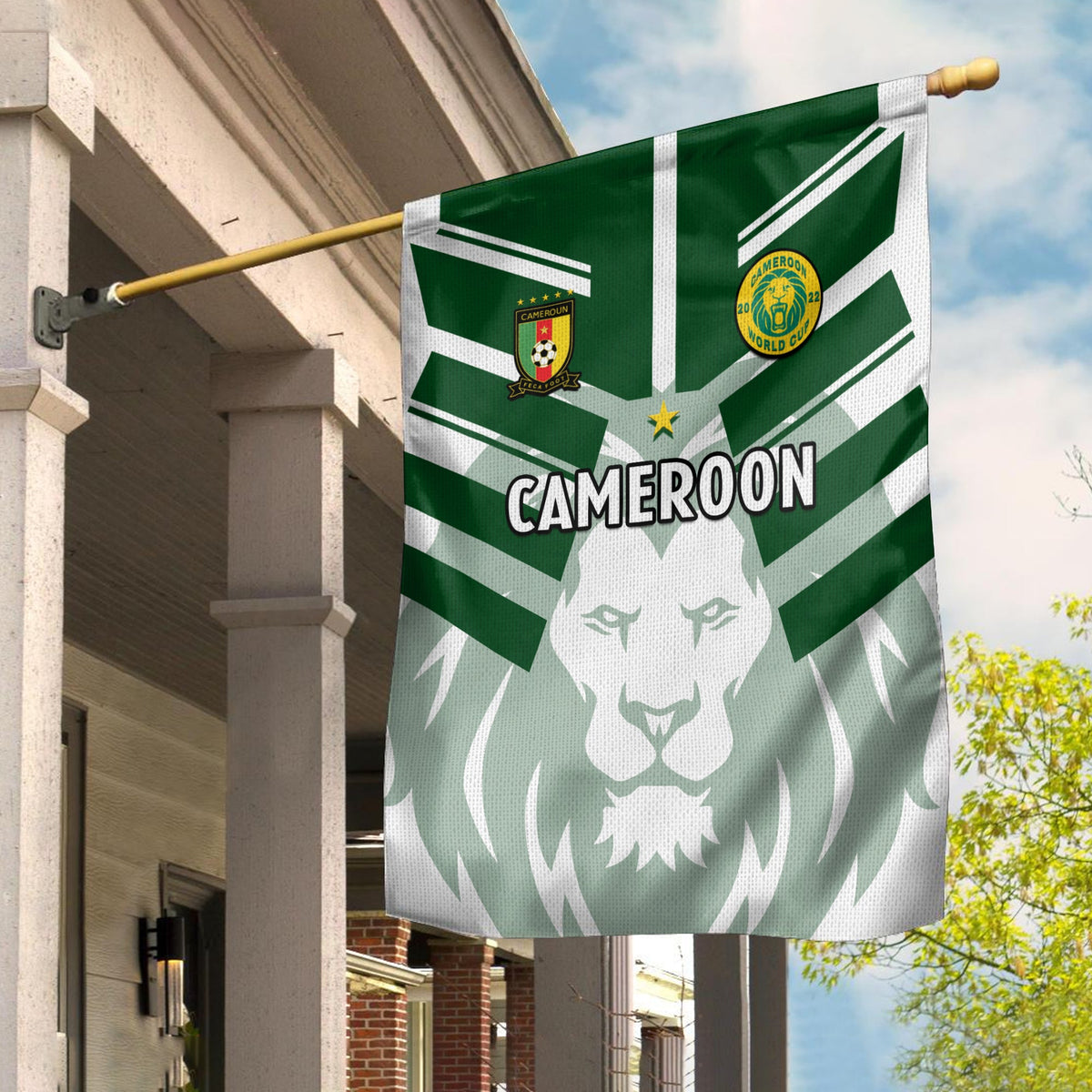 Cameroon football flag with green-and-white stripes, lion emblem and CAMEROON text