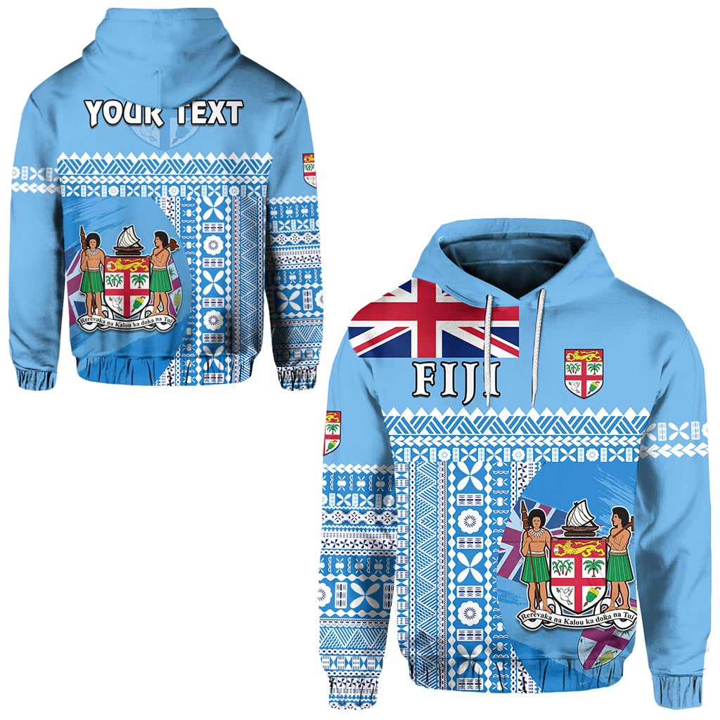 Blue hoodie tapa-pattern with Fiji shield graphic and 'YOUR TEXT' on back