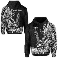 Hoodie with black base and white Polynesian ukulele floral graphic, hood up