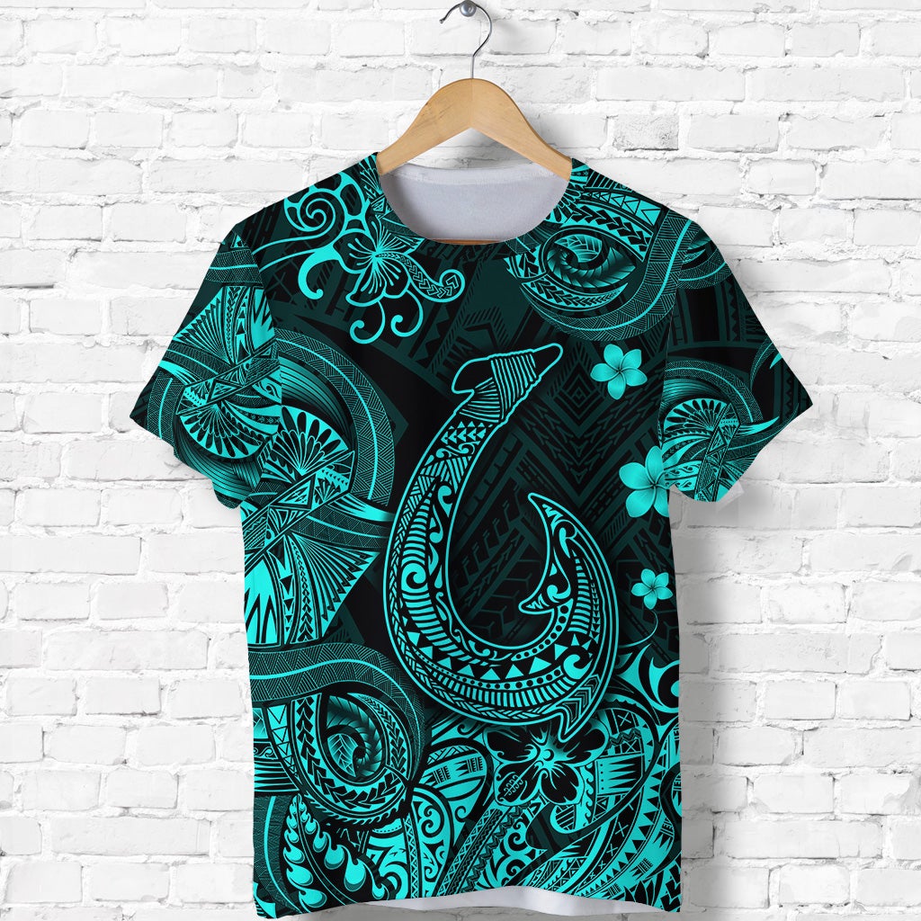 Turquoise and dark patterned Hawaiian fishhook T-shirt with floral motifs