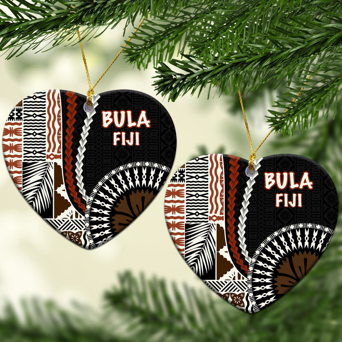 Heart-shaped ceramic Christmas ornament, black “BULA FIJI” with orange and white tribal print