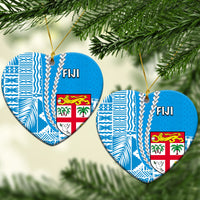 Fiji heart ceramic Christmas ornament with blue patterned design, crest and “FIJI”, hanging